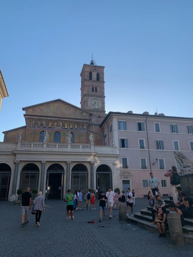 Outside facade and bell tower of Basilica of Santa Maria in Trastevere.