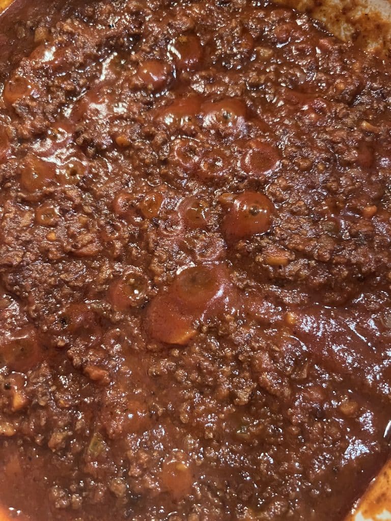 The Tuscan Ragu is done when the sauce is thick and clings to the spoon.