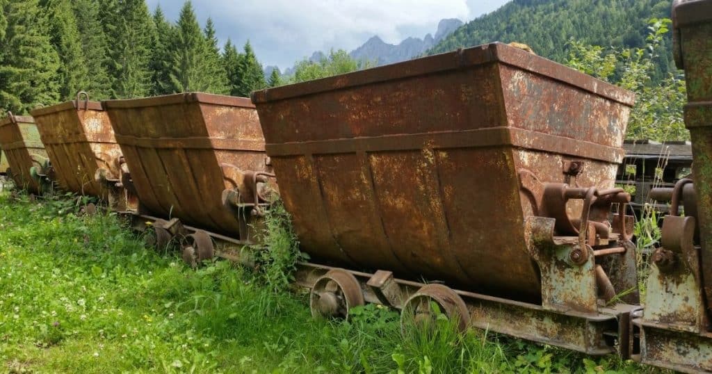 Old rusty carts transporting metal in Schilpario.