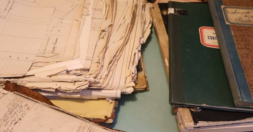 Loose pages of parish records. A genealogist on an ancestry tour can help with disorganized records.