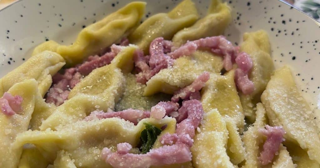 Close up of Scarpinocc pasta with bacon made at the Bergamo cooking class