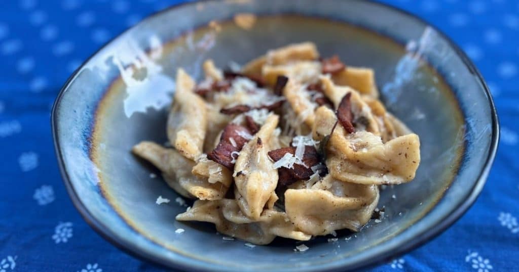 How to make Scarpinoocc topped with bacon and sage.