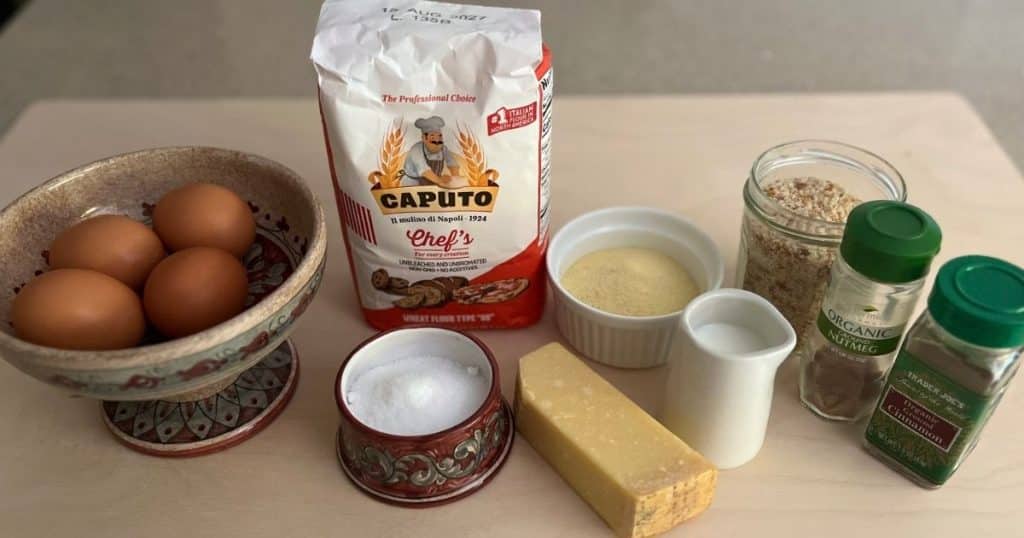 Eggs, flour, salt, parmesan, semolina, milk, bread crumbs, spices are the ingredients in Scarpinocc.